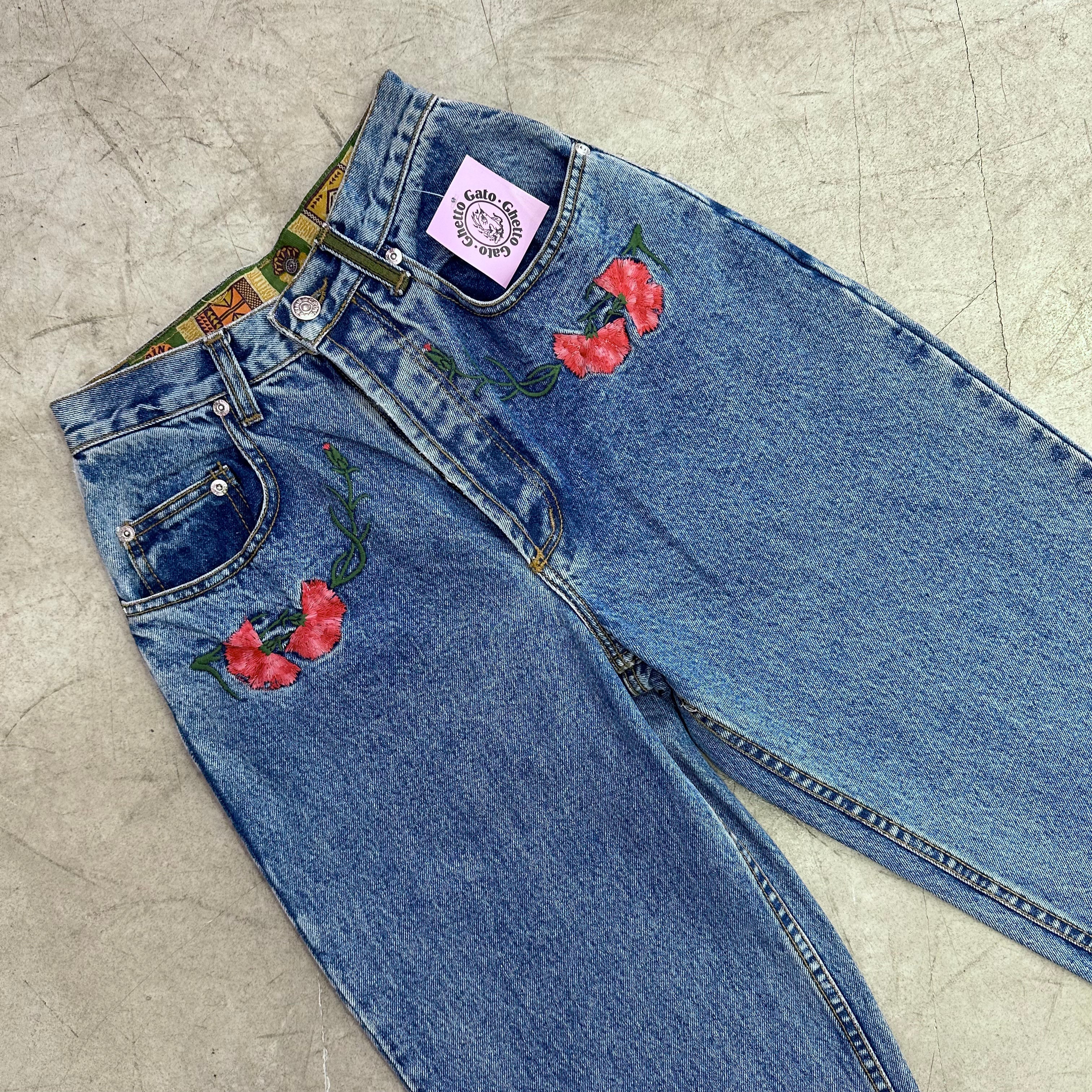 Jeans with 2025 embroidered roses